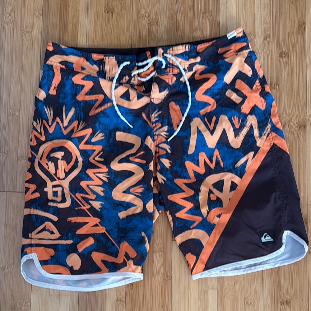 Quiksilver Blue and Orange Board Shorts with Geometric Pattern